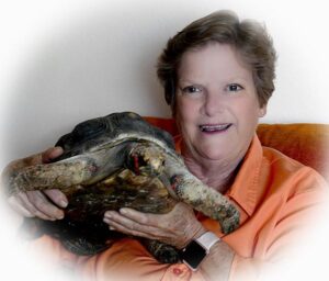 elaine a powers with red foot tortoise