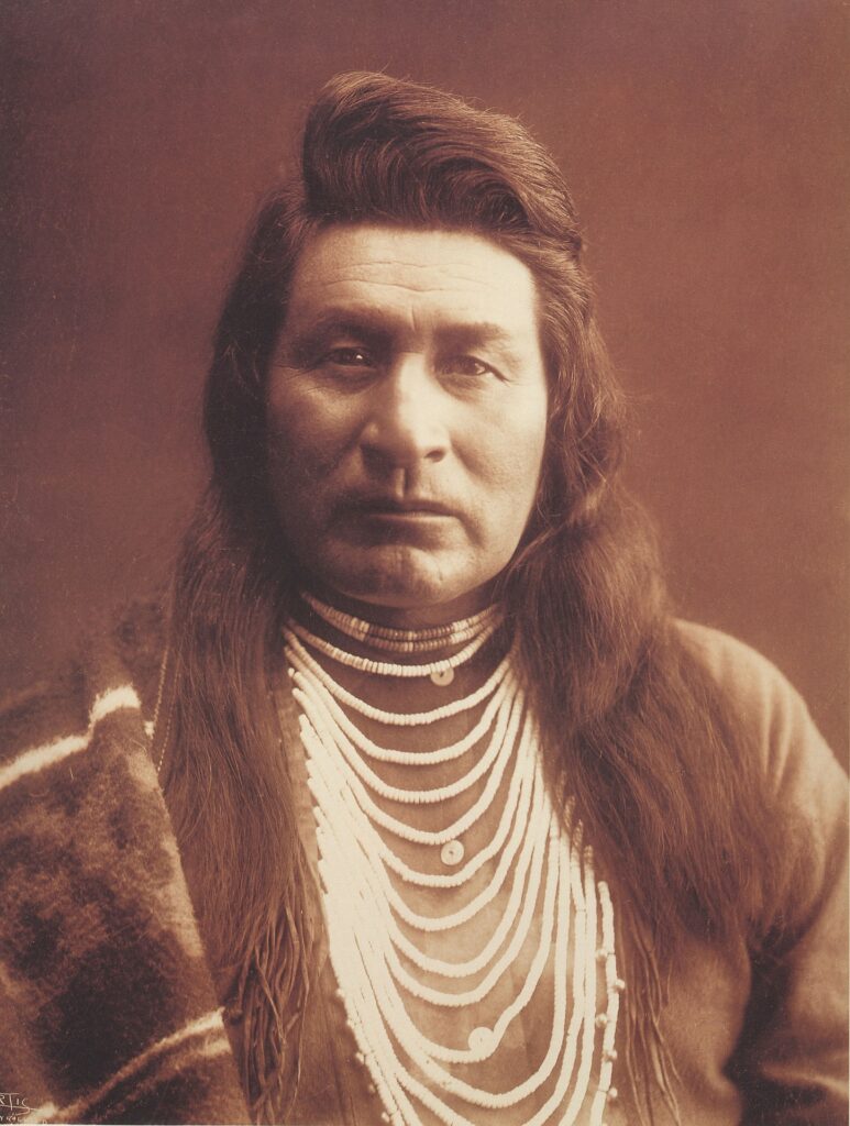 photo of native American man, possibly taken in 1899