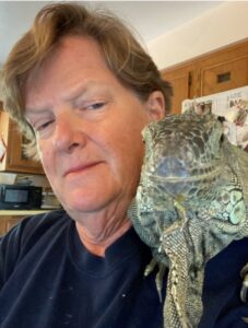 photo of elaine a powers with iguana