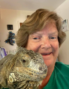 photo of elaine powers with her iguana muse, Calliope