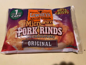 A bag of Lowrey's Microwave Pork Rings, original flavor.