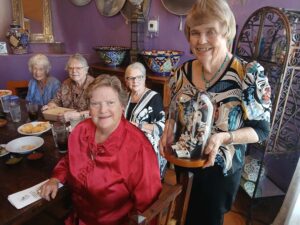 Elaine being presented the Julie Goddard Award at a luncheon.
